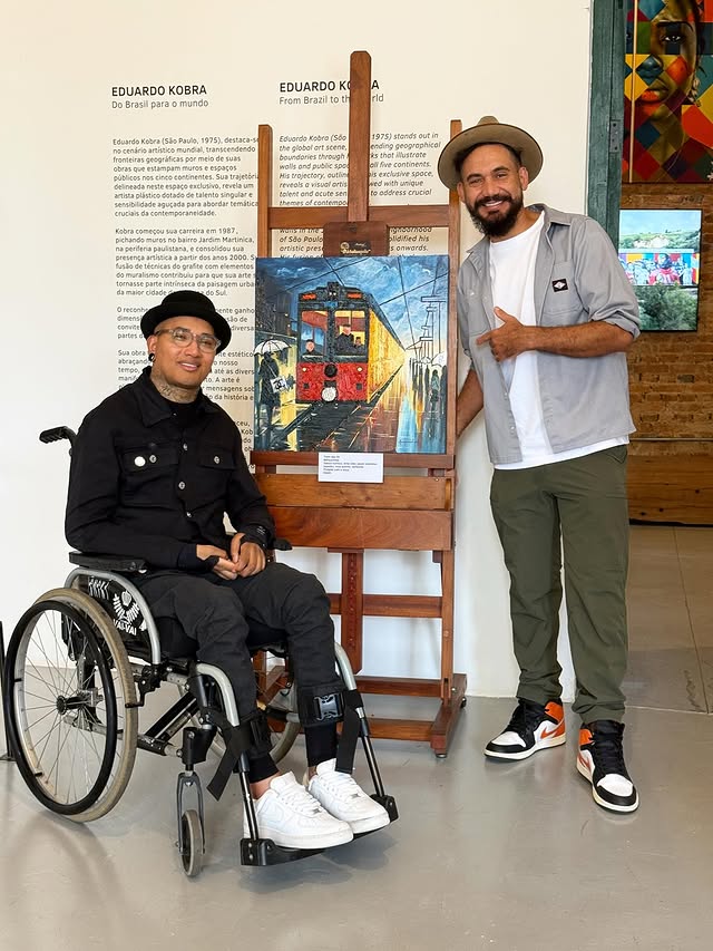 Marquinhos com o muralista Eduardo Kobra
